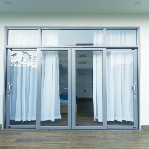 CỬA LÙA 4 CÁNH GROBER MÀU XÁM ÁNH KIM TẠI SÀI GÒN